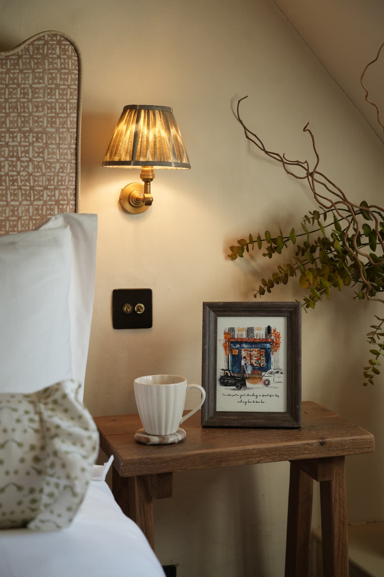 Bedside in evening lamplight